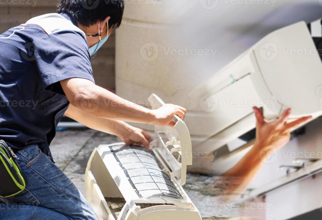 Kinh Nghiệm Chọn Nơi Sửa Máy Lạnh Tại Thủ Dầu Một 43 male technician cleaning air conditioner indoors repairman washing dirty compartments air conditioner maintenance and repairing concepts photo
